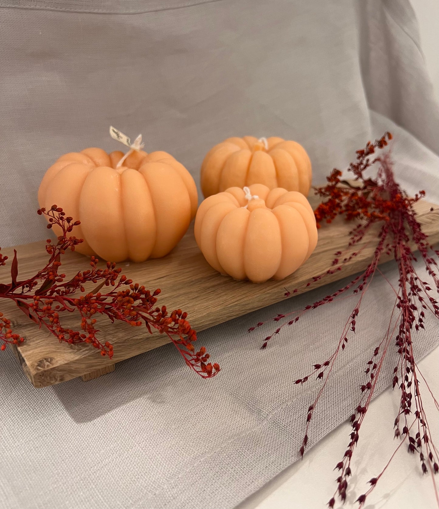 Set di 3 candele *arancioni* a forma di zucca