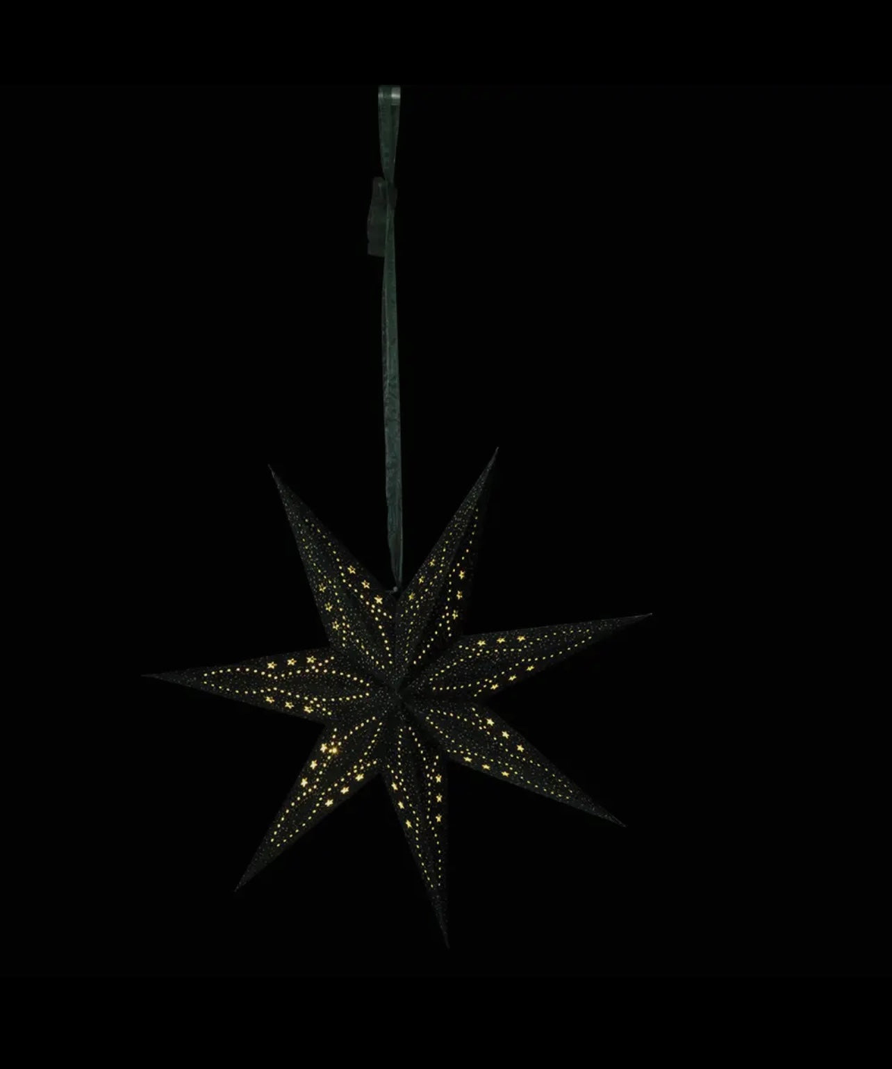 Stella luminosa in velluto grigio scuro